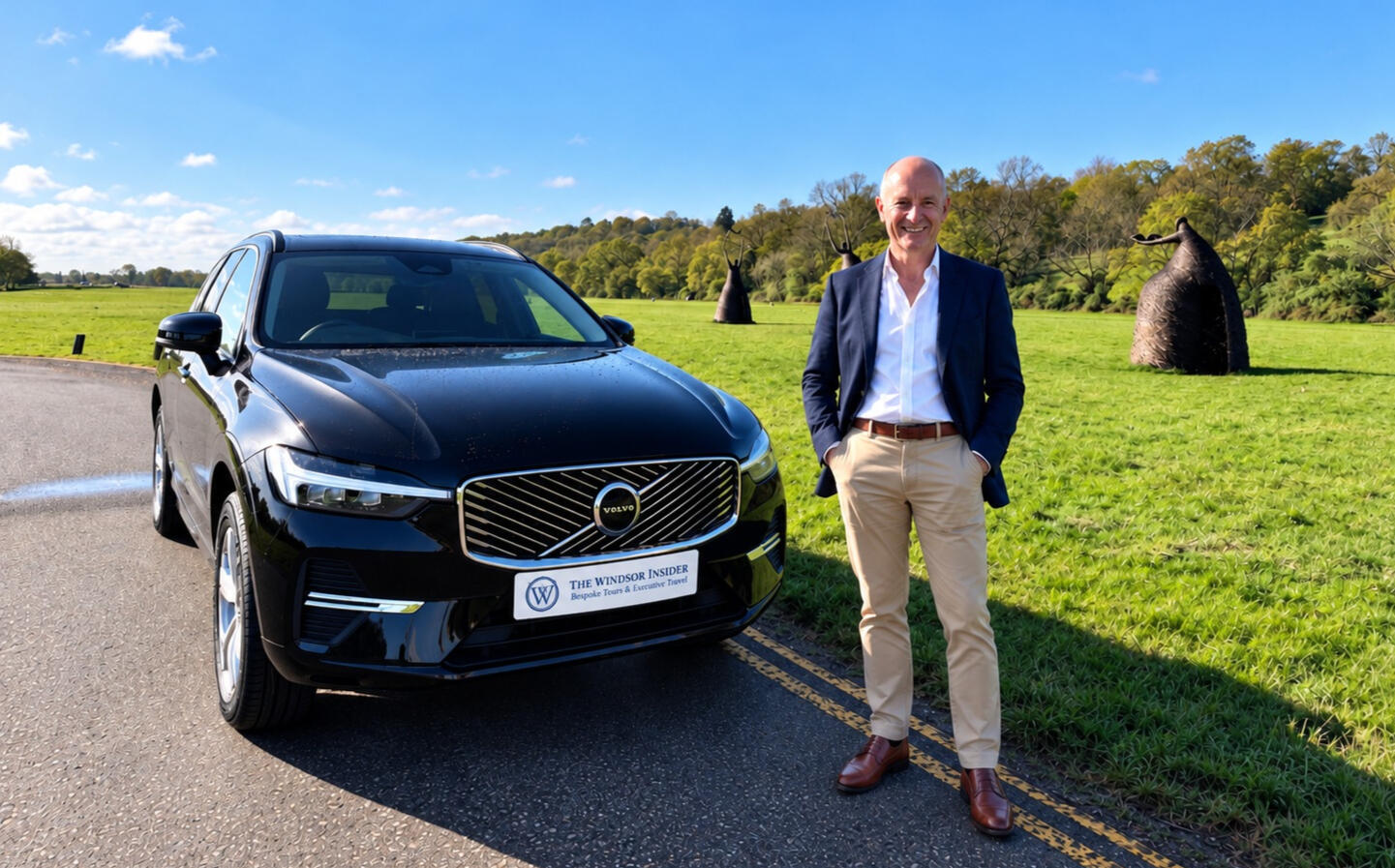 Paul Bruton with Volvo at Runnymede Paul Bruton standing beside a black Volvo XC60 at Runnymede, near Windsor.